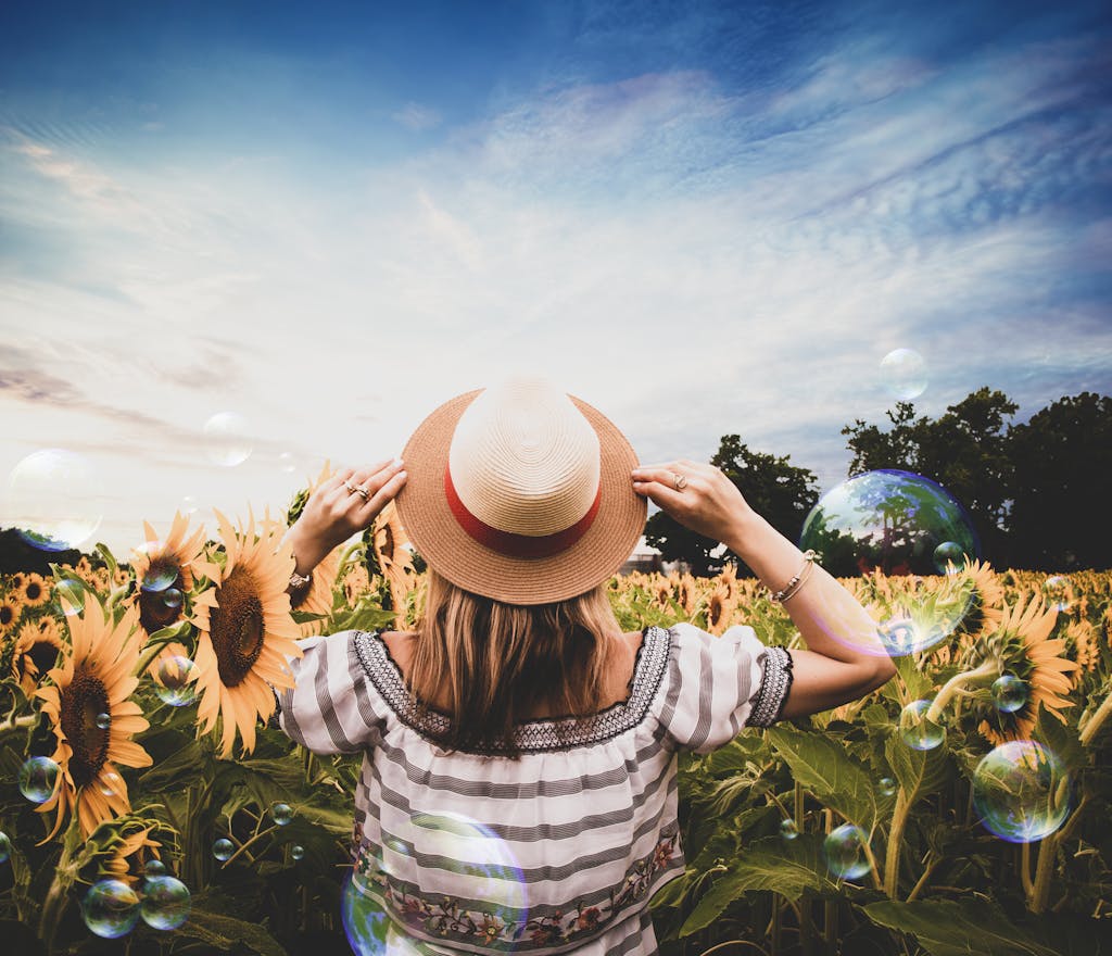 Standing Woman Surrounded of Sunflowers